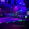 Dance floor complimented by smoke machine, laser lights, and rotating lights to provide exciting and interesting party atmosphere