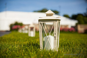 Close up of lantern at outdoor wedding